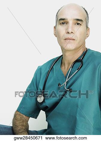 Portrait of a male doctor with a stethoscope around his neck View Large Photo Image Stock Image - Portrait of a male doctor with a stethoscope around his neck. Fotosearch