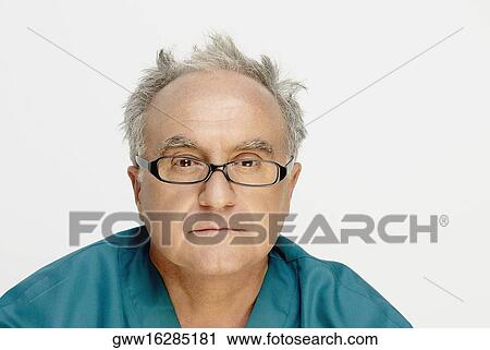 Stock Image - Portrait of a senior man thinking. Fotosearch
