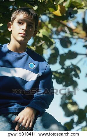 Portrait of a teenage boy View Large Photo Image Stock Image - Portrait of a teenage boy. Fotosearch