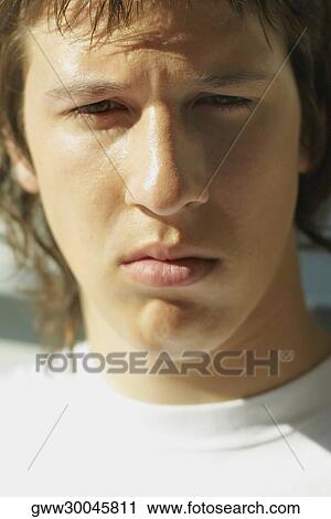 Stock Image - Portrait of a teenage boy. Fotosearch
