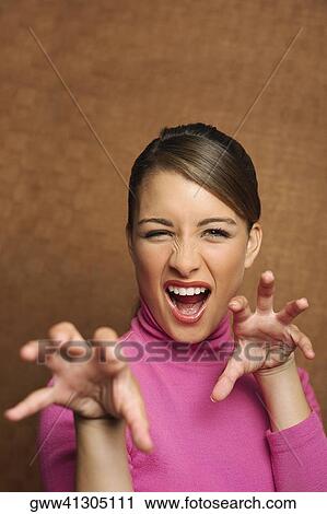 Portrait of a teenage girl shouting View Large Photo Image Stock Image - Portrait of a teenage girl shouting. Fotosearch