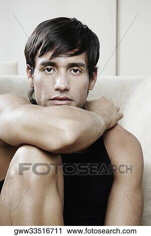 Portrait of a young man thinking View Large Photo Image Stock Image - Portrait of a young man thinking. Fotosearch
