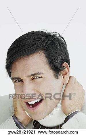 Portrait of a young man wearing a neck brace View Large Photo Image Stock Image - Portrait of a young man wearing a neck brace. Fotosearch