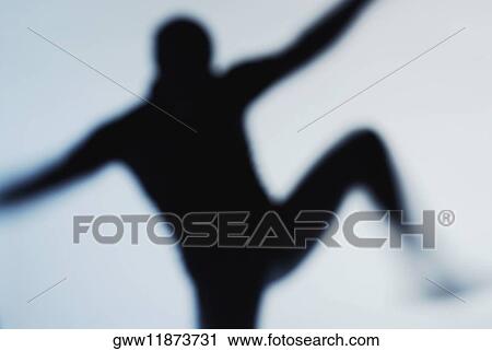 Silhouette of a person dancing View Large Photo Image Stock Image - Silhouette of a person dancing. Fotosearch