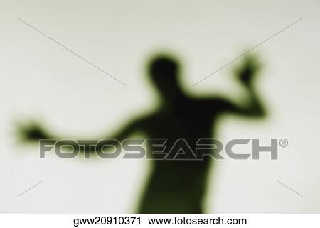 Silhouette of a person dancing View Large Photo Image Stock Image - Silhouette of a person dancing. Fotosearch