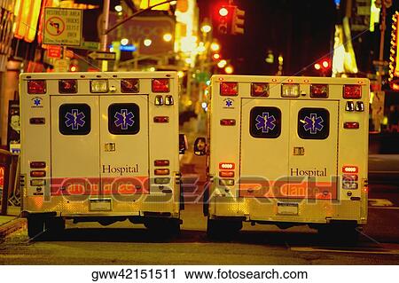 Two ambulances on the road View Large Photo Image Stock Image - Two ambulances on the road. Fotosearch