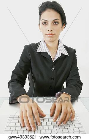 Businesswoman using a laptop View Large Photo Image Stock Image - Businesswoman using a laptop. Fotosearch