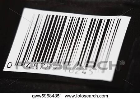 Stock Image - Close-up of a bar code on a black background. Fotosearch
