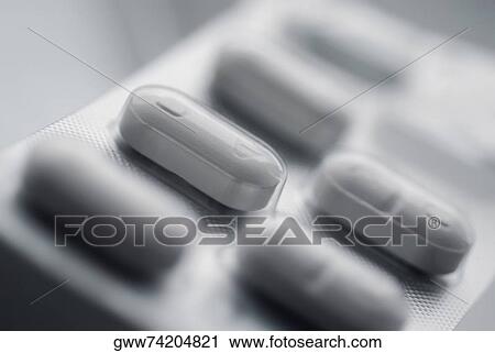 Close-up of a blister pack of tablets View Large Photo Image Stock Image - Close-up of a blister pack of tablets. Fotosearch