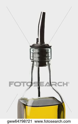 Close-up of a bottle of olive oil View Large Photo Image Stock Image - Close-up of a bottle of olive oil. Fotosearch