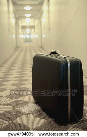 Close-up of a briefcase in the corridor of a hotel View Large Photo Image Stock Image - Close-up of a briefcase in the corridor of a hotel. Fotosearch
