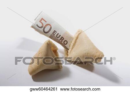 Close-up of a broken fortune cookie with fifty Euro dollars View Large Photo Image Stock Image - Close-up of a broken fortune cookie with fifty Euro dollars. Fotosearch