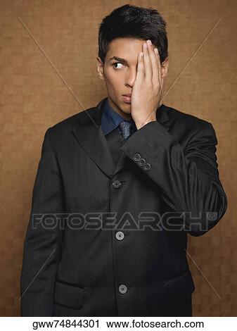 Close-up of a businessman looking sideways View Large Photo Image Stock Image - Close-up of a businessman looking sideways. Fotosearch