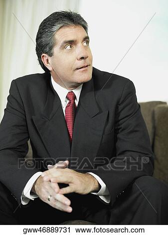 Close-up of a businessman with his hands clasped View Large Photo Image Stock Image - Close-up of a businessman with his hands clasped. Fotosearch