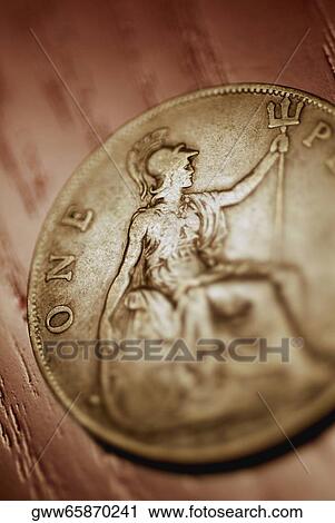Stock Image - Close-up of a coin. Fotosearch