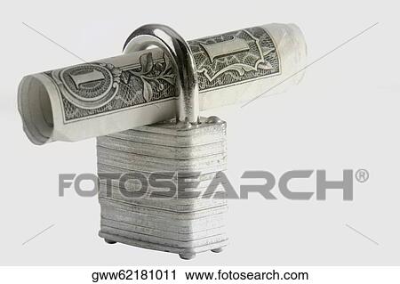 Stock Image - Close-up of a combination lock and a dollar bill. Fotosearch