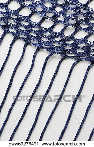 Stock Image - Close-up of a crochet fabric. Fotosearch