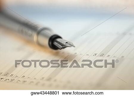 Close-up of a fountain pen on a diary View Large Photo Image Stock Image - Close-up of a fountain pen on a diary. Fotosearch