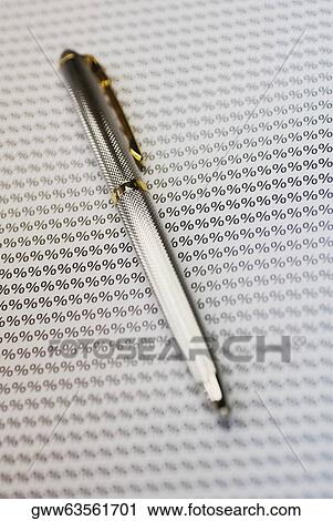 Close-up of a fountain pen on a sheet of percentage signs View Large Photo Image Stock Image - Close-up of a fountain pen on a sheet of percentage signs. Fotosearch