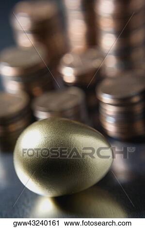 Close-up of a golden egg View Large Photo Image Stock Image - Close-up of a golden egg. Fotosearch