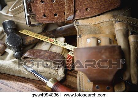 Close-up of a hammer and a screwdriver View Large Photo Image Stock Image - Close-up of a hammer and a screwdriver. Fotosearch