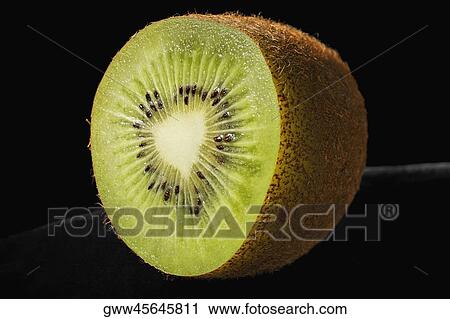 Close-up of a kiwi fruit View Large Photo Image Stock Image - Close-up of a kiwi fruit. Fotosearch