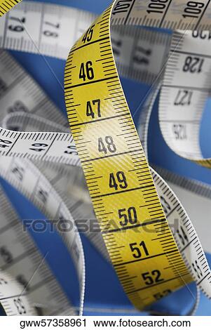 Close-up of a measuring tape View Large Photo Image Stock Image - Close-up of a measuring tape. Fotosearch