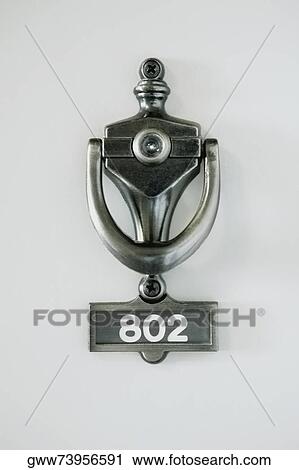 Close-up of a metal door knocker View Large Photo Image Stock Image - Close-up of a metal door knocker. Fotosearch
