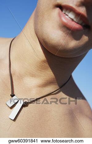 Close-up of a mid adult man smiling View Large Photo Image Stock Image - Close-up of a mid adult man smiling. Fotosearch