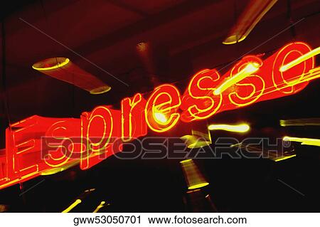 Stock Image - Close-up of a neon sign lit up at night. Fotosearch