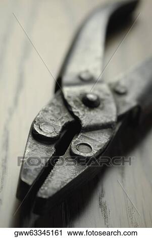 Close-up of a pair of pliers View Large Photo Image Stock Image - Close-up of a pair of pliers. Fotosearch