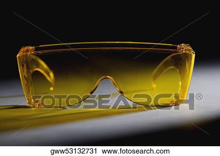 Close-up of a pair of sunglasses View Large Photo Image Stock Image - Close-up of a pair of sunglasses. Fotosearch