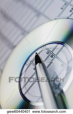Close-up of a pen and a CD View Large Photo Image Stock Image - Close-up of a pen and a CD. Fotosearch