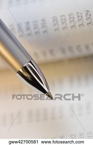 Close-up of a pen on a document View Large Photo Image Stock Image - Close-up of a pen on a document. Fotosearch