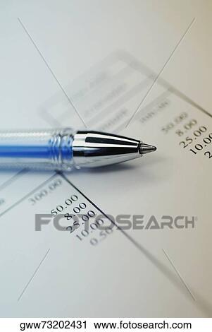 Close-up of a pen on a document View Large Photo Image Stock Image - Close-up of a pen on a document. Fotosearch