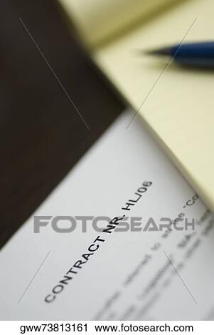 Close-up of a pen on a notepad View Large Photo Image Stock Image - Close-up of a pen on a notepad. Fotosearch
