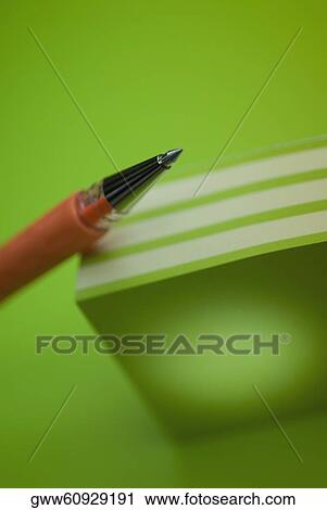Close-up of a pen on a stack of colored post-it notes View Large Photo Image Stock Image - Close-up of a pen on a stack of colored post-it notes. Fotosearch