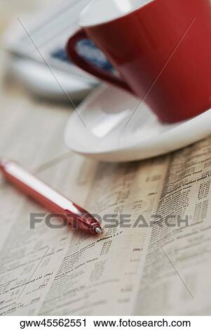 Close-up of a pen with a cup and a saucer View Large Photo Image Stock Image - Close-up of a pen with a cup and a saucer. Fotosearch