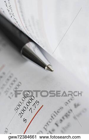 Close-up of a pen with a document View Large Photo Image Stock Image - Close-up of a pen with a document. Fotosearch