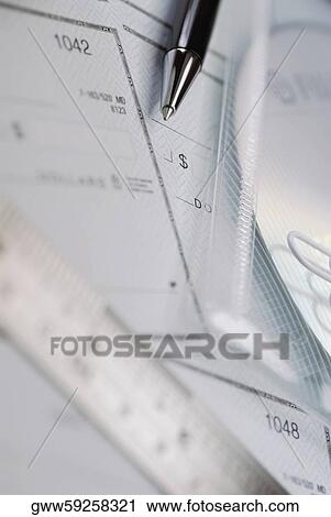 Close-up of a pen with a ruler on documents View Large Photo Image Stock Image - Close-up of a pen with a ruler on documents. Fotosearch