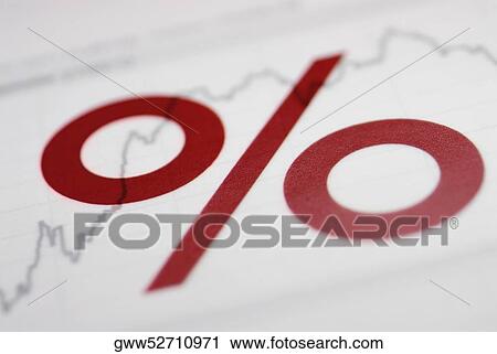 Stock Image - Close-up of a percentage sign on a line graph. Fotosearch