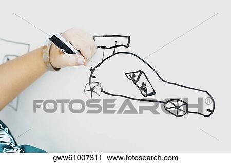 Close-up of a person's hand drawing a sketch View Large Photo Image Stock Image - Close-up of a person's hand drawing a sketch. Fotosearch