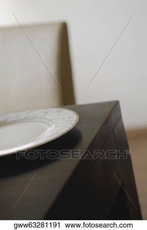 Close-up of a plate on the table View Large Photo Image Stock Image - Close-up of a plate on the table. Fotosearch