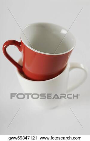 Close-up of a red tea cup in a white tea cup View Large Photo Image Stock Image - Close-up of a red tea cup in a white tea cup. Fotosearch