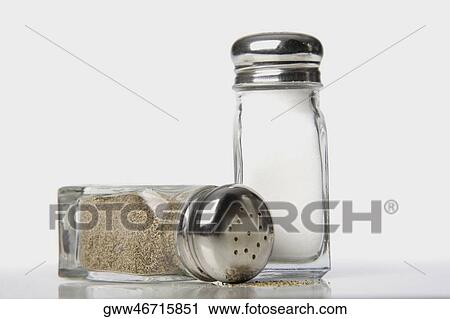 Close-up of a salt and a pepper shaker View Large Photo Image Stock Image - Close-up of a salt and a pepper shaker. Fotosearch