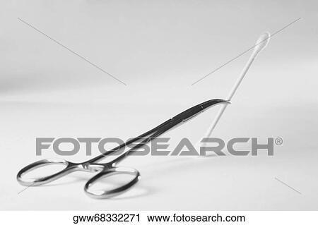 Close-up of a scissor with a cotton swab View Large Photo Image Stock Image - Close-up of a scissor with a cotton swab. Fotosearch