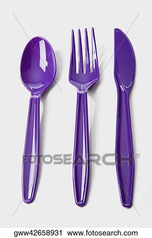 Stock Image - Close-up of a spoon with a knife and a fork. Fotosearch