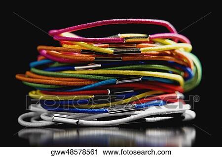 Close-up of a stack of rubber bands View Large Photo Image Stock Image - Close-up of a stack of rubber bands. Fotosearch
