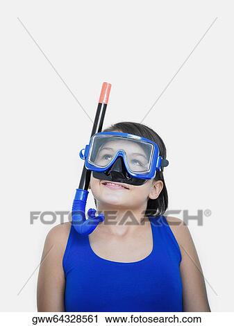 Close-up of a teenage girl smiling with a snorkel on her face View Large Photo Image Stock Image - Close-up of a teenage girl smiling with a snorkel on her face. Fotosearch