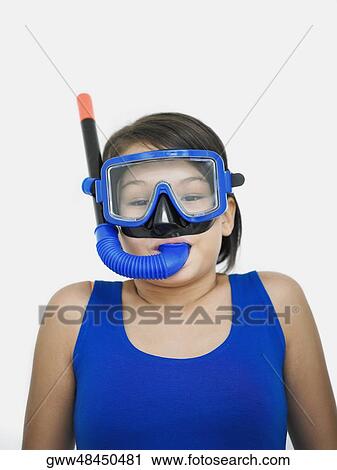 Close-up of a teenage girl with a snorkel on her face View Large Photo Image Stock Image - Close-up of a teenage girl with a snorkel on her face. Fotosearch